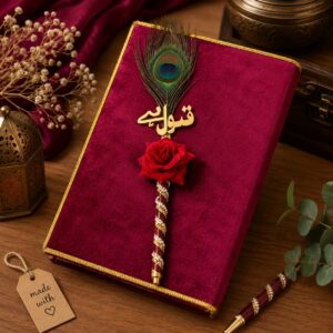 Maroon velvet Quran cover with decorative rose pen